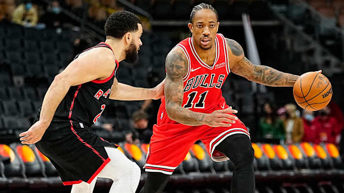 Chicago Bulls forward DeMar DeRozan (11) drives to the net against Toronto Raptors guard Fred VanVleet.